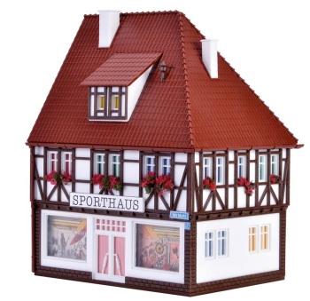 Casa con tiende de deportes.