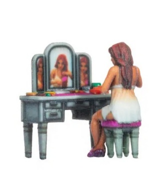 Mujer en el tocador.