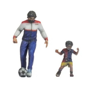 Padre e hijo al fútbol.